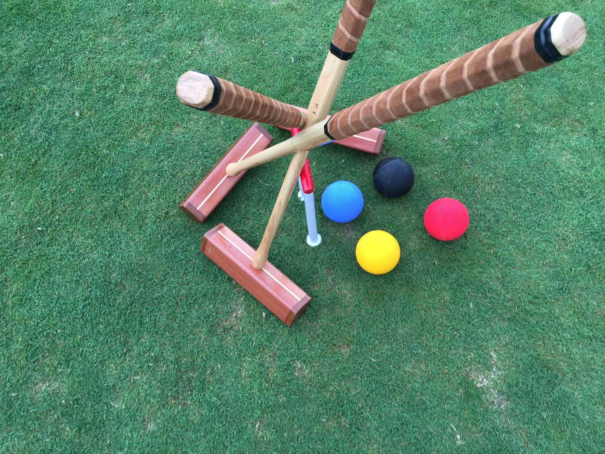 Mallets and balls on the lawn